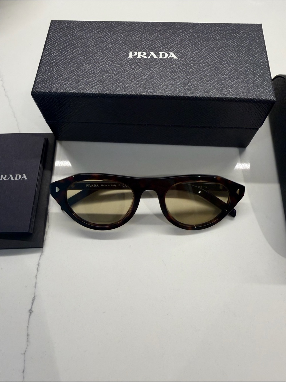 Prada Tortoiseshell Sunglasses